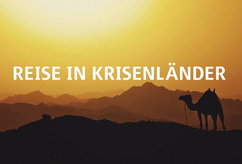 Kamelsilhouette am Sonnenuntergang "Reise in Krisenländer"